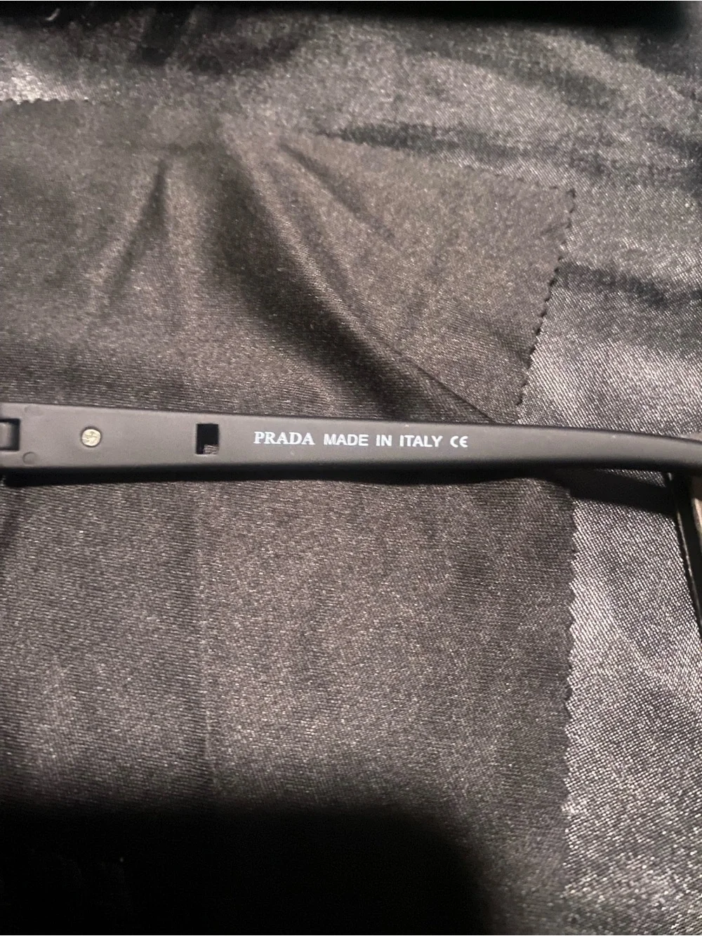 Prada Black Sunglasses with Red Accent